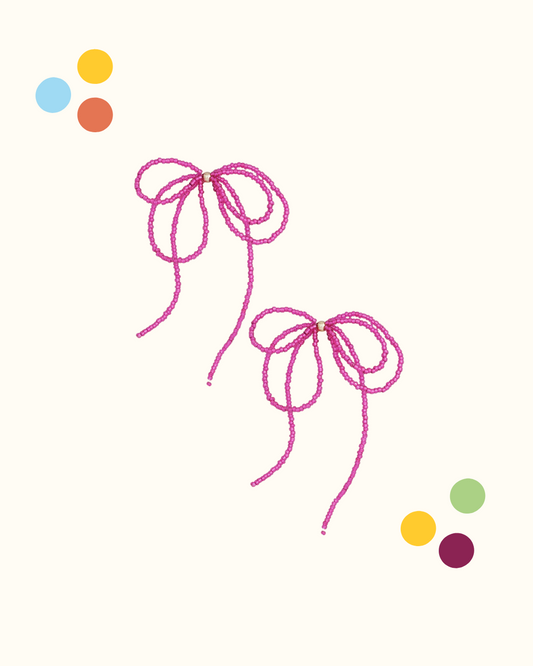 Orecchini fiocco perline fuxia